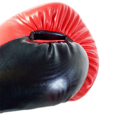 Close-up of a black and red boxing glove on a white background