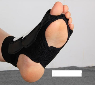 Black toe separator on a foot