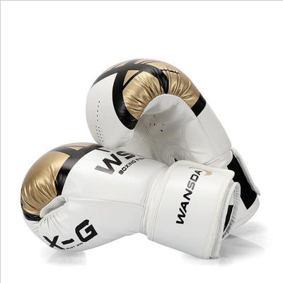 Pair of white boxing gloves with gold and black accents 