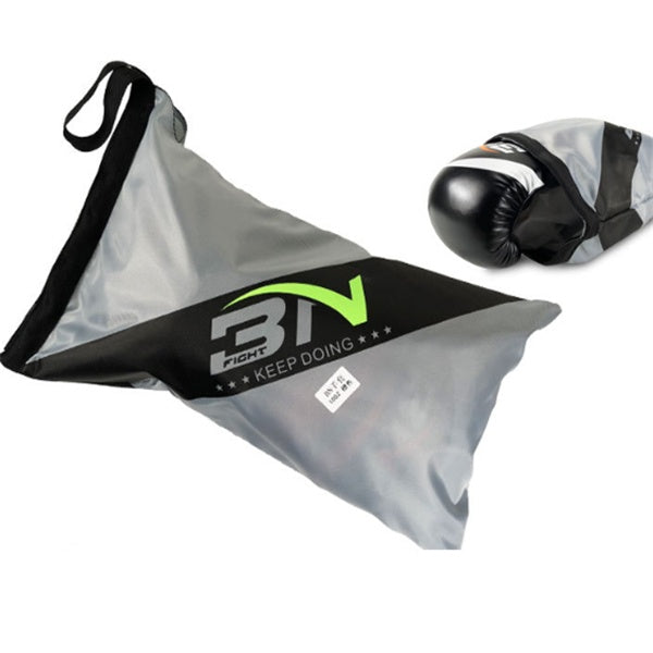 Gray sandbag with black straps and green logo, next to a black boxing glove on a white background