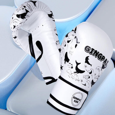 White boxing gloves with black designs and 'GINGER' branding