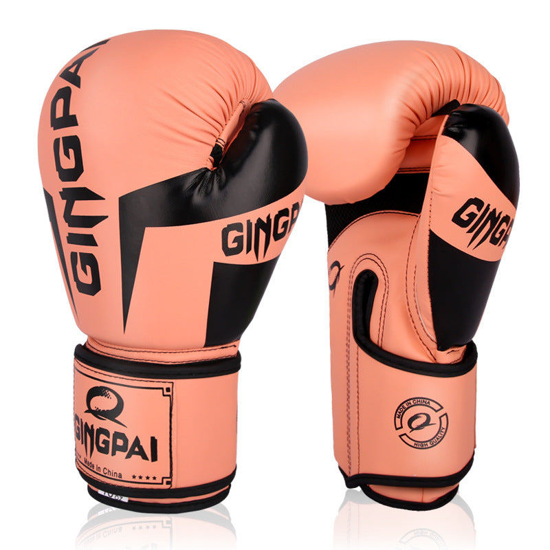 Pair of pink boxing gloves with black accents and 'Gingpai' branding