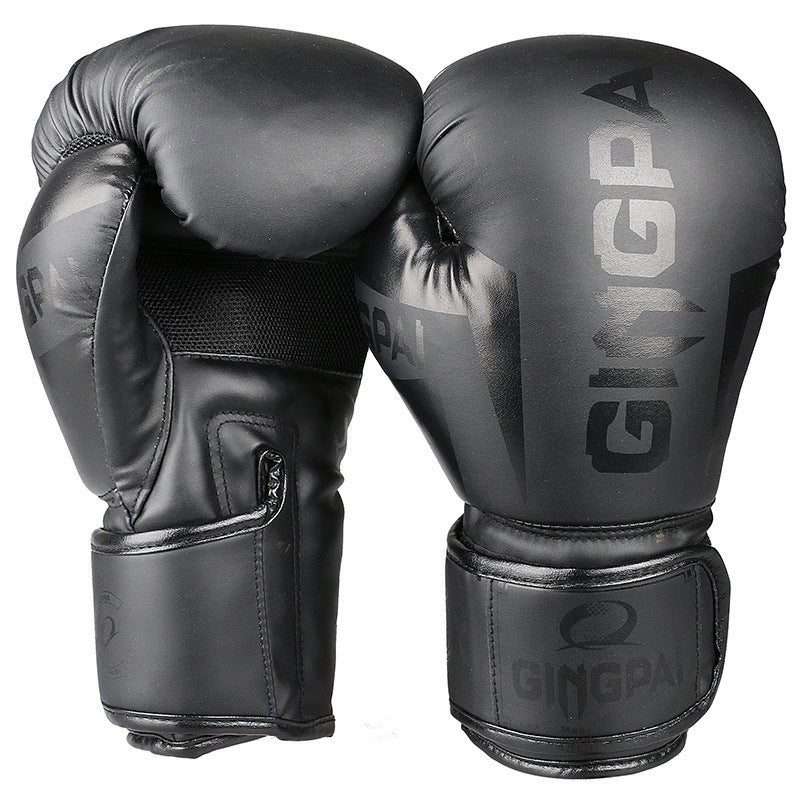 Black boxing gloves with 'Gingpa' branding